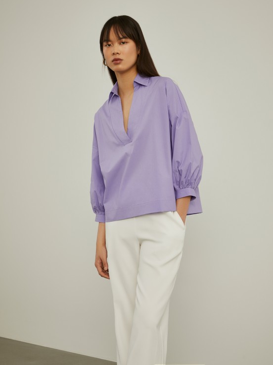 Shirt with flared sleeves