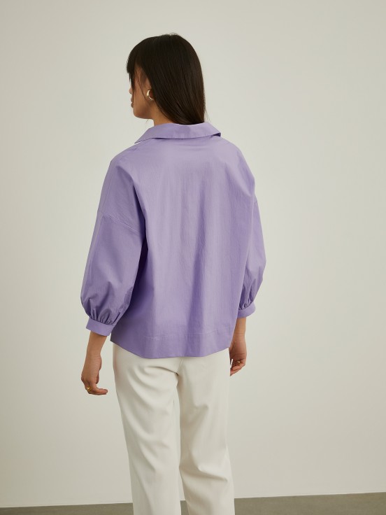 Shirt with flared sleeves