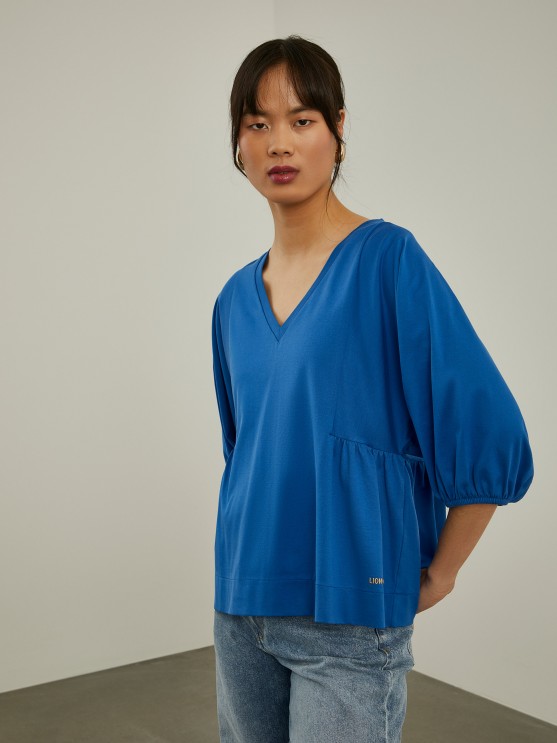Flared sleeve sweater