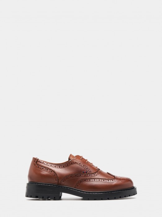 Zapatos brogue de piel