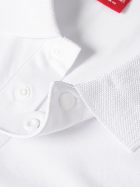 Polo slim fit con muelles