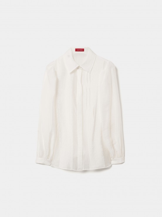 Camisa con pliegues
