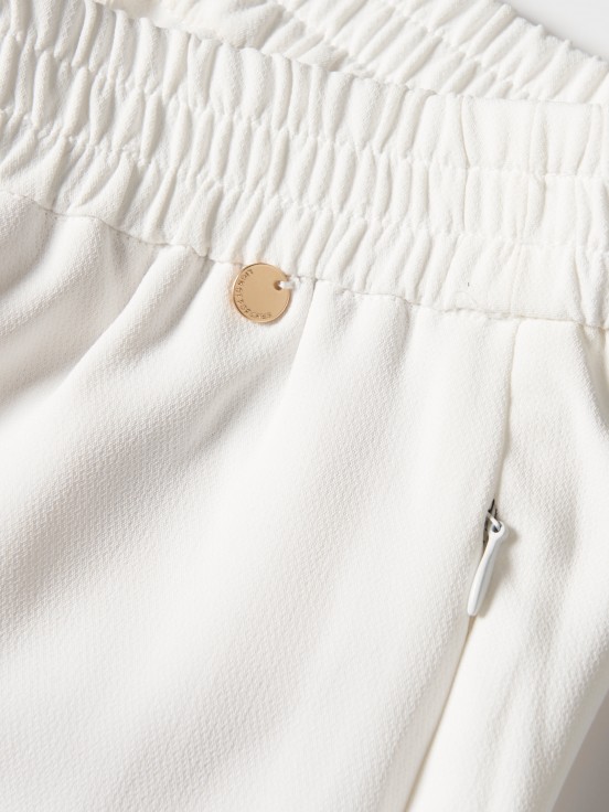 Pantaln fluido con pinzas