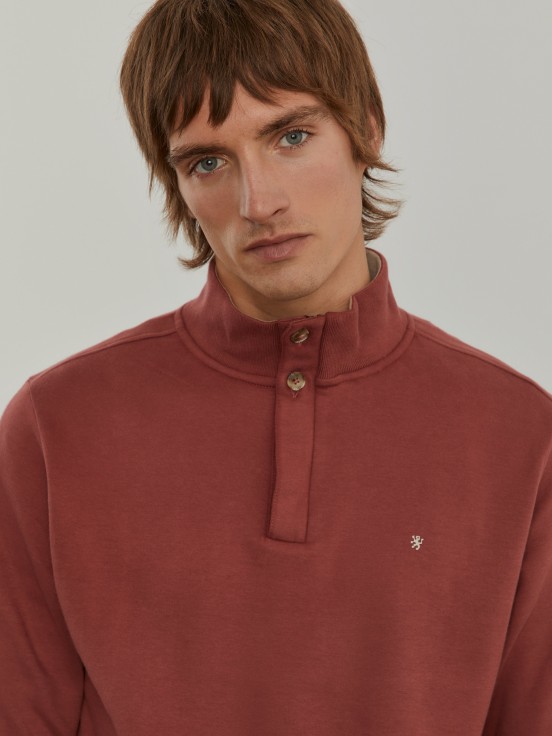 Sweater with buttons and half zip