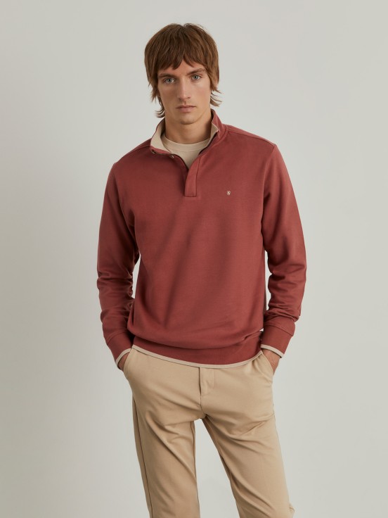 Sweater with buttons and half zip