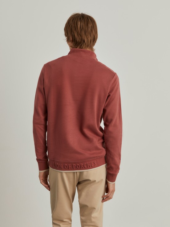 Sweater with buttons and half zip