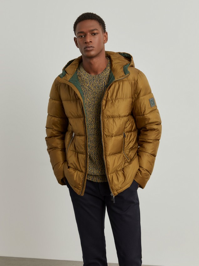 Man's padded technical jacket with removable hood