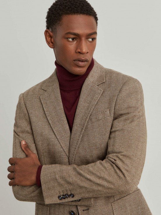 Man's slim fit blazer with herringbone pattern and pockets