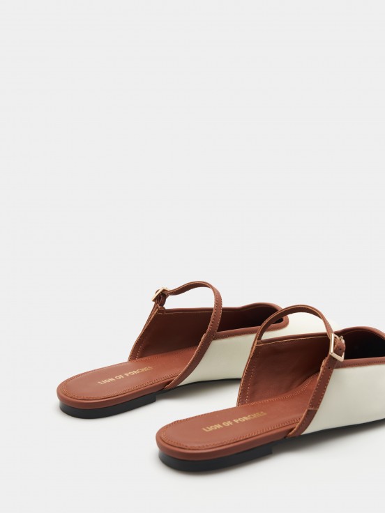 Mules rasas em pele