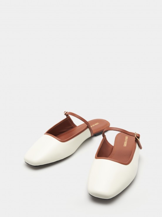 Mules rasas em pele