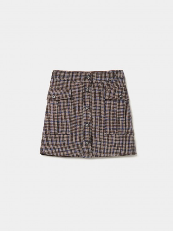 Short skirt with pied poule pattern