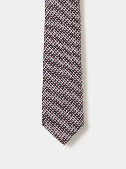 Tie with checkered pattern