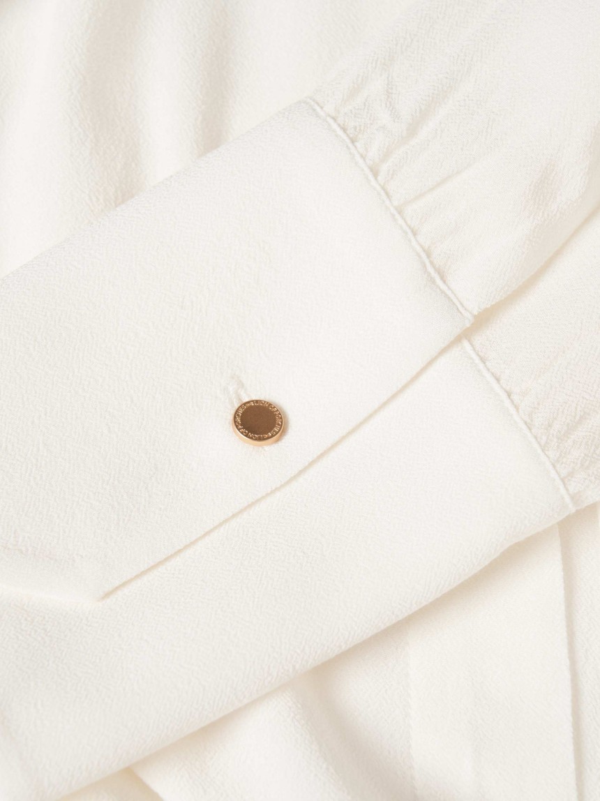 Camisa fluida