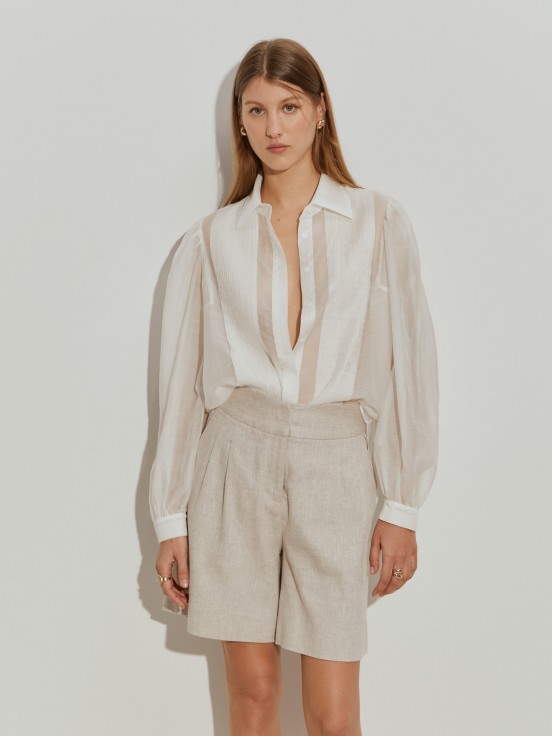 Camisa con pliegues