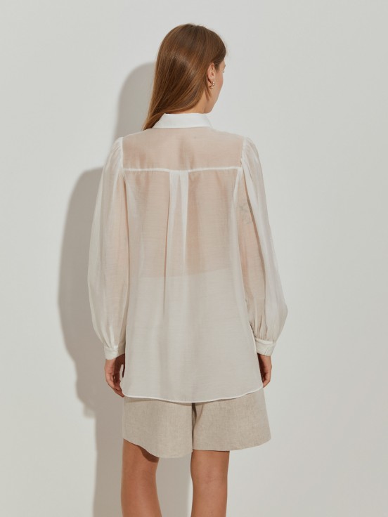 Camisa con pliegues