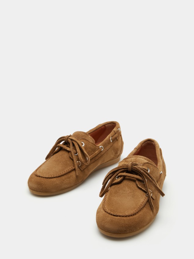 Sapatos de vela em camur�a