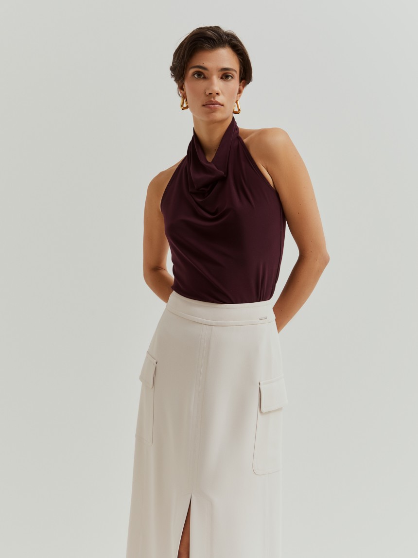 Saia midi com bolsos