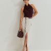 Saia midi com bolsos