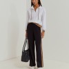 Pantalones de punto con rayas laterales