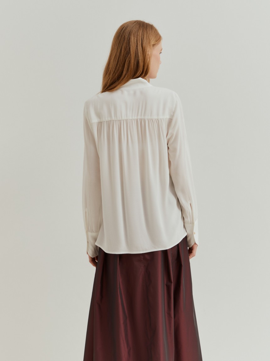 Camisa fluida