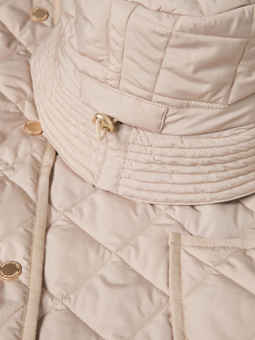 Quilted jacket with a bucket hat