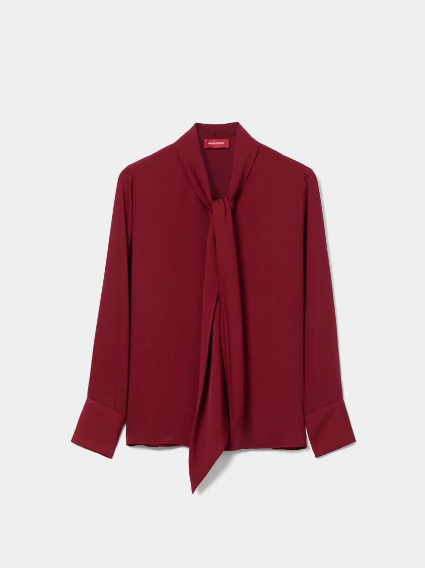 Blusa fluida com la�ada