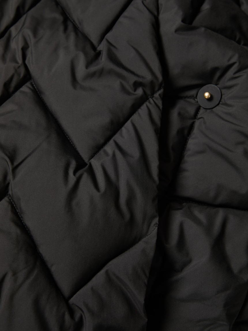 Quilted jacket with a belt