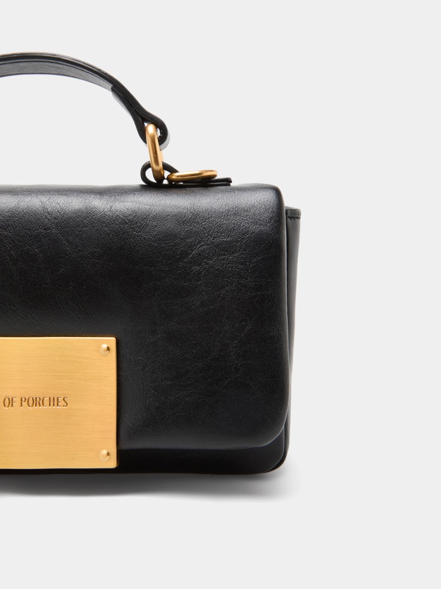 Shoulder bag with a charm