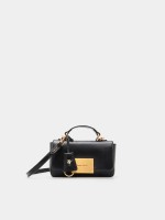 Shoulder bag with a charm