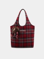 Reversible tote bag with charm