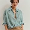 Camisa com mangas morcego