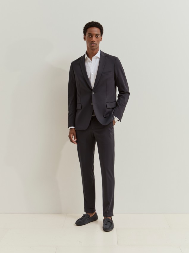 Calças travel slim fit