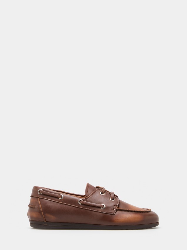 Sapatos de vela