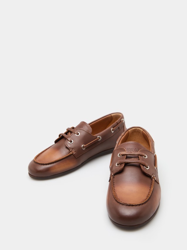 Sapatos de vela