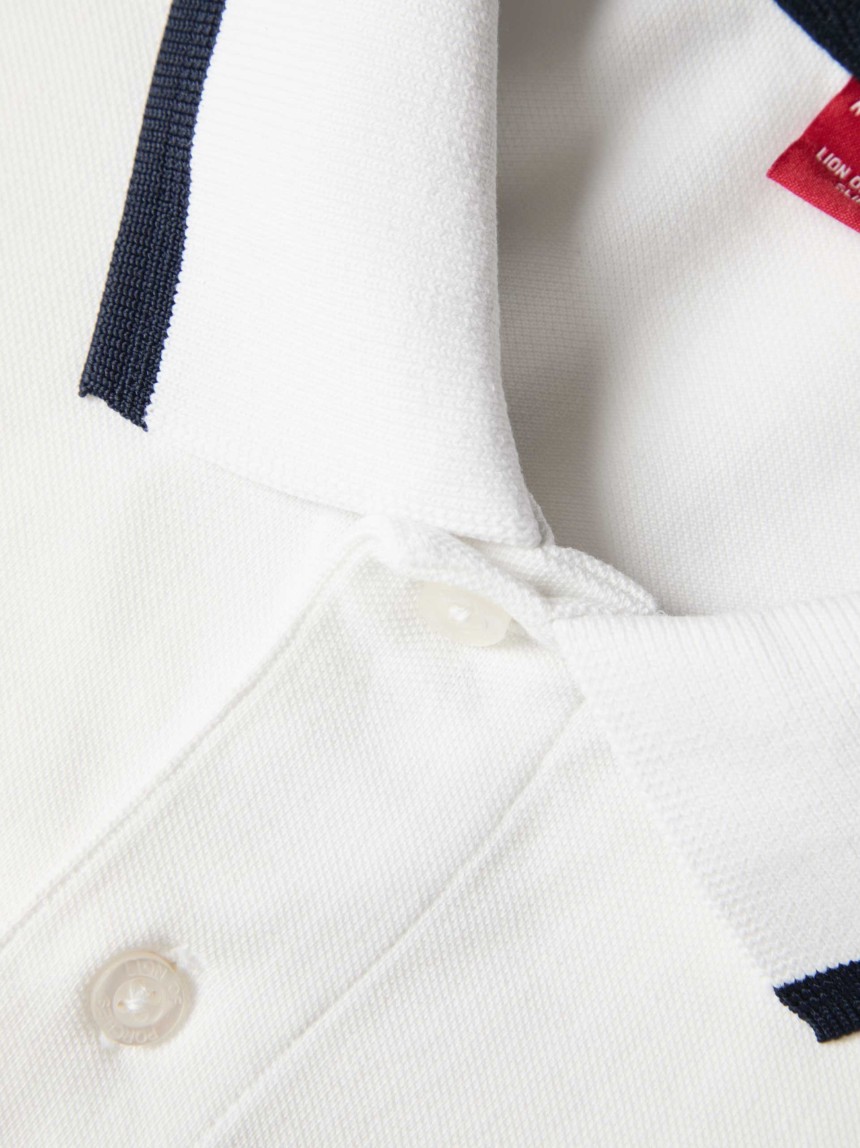 Polo piqu� com riscas e estampado