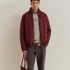 Coat with hidden hood