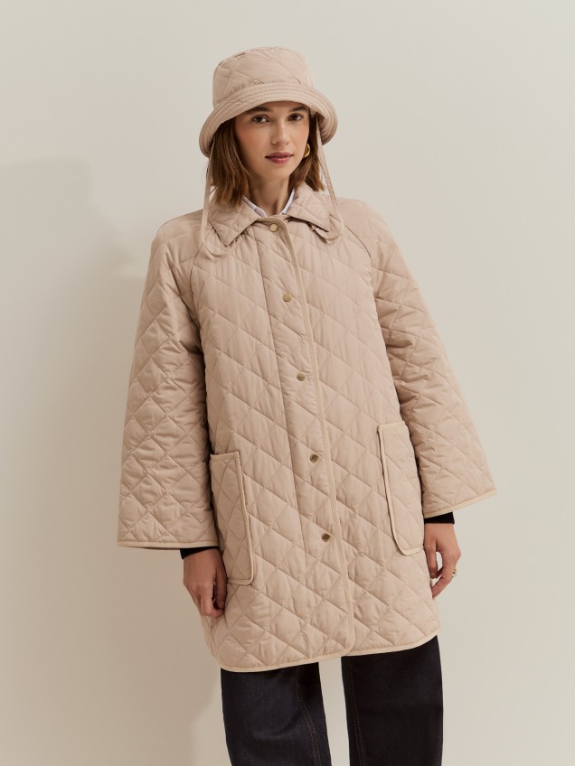 Quilted jacket with a bucket hat