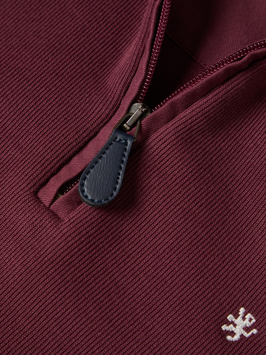 Knitted sweater with half-zip closure