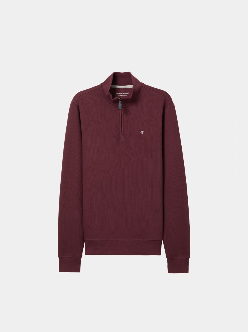 Knitted sweater with half-zip closure