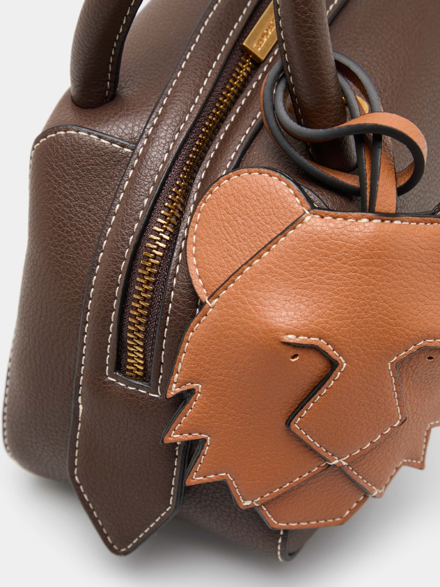 Bolso de mano con colgante