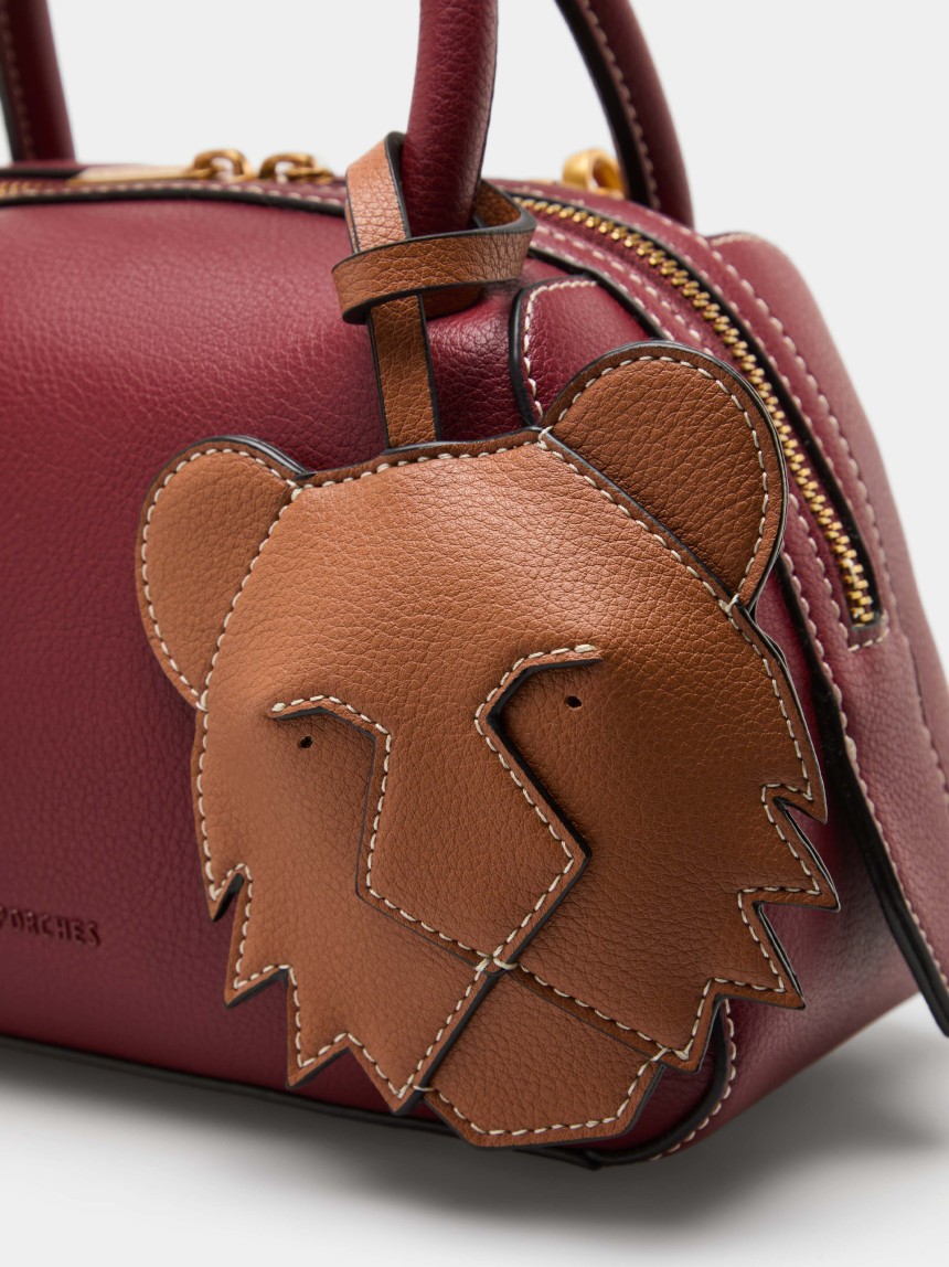 Bolso de mano con colgante