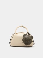 Bolso de mano con colgante