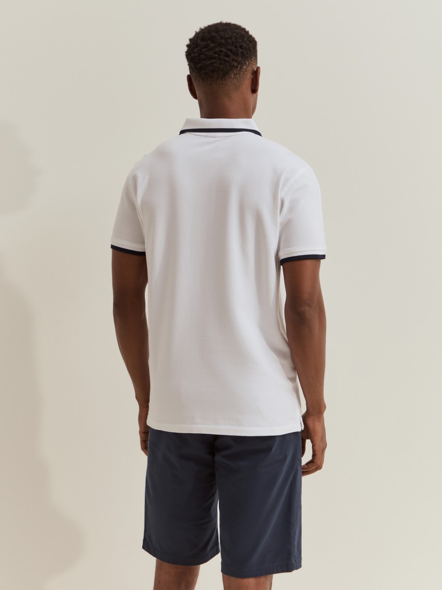 Polo shirt with stripes and print
