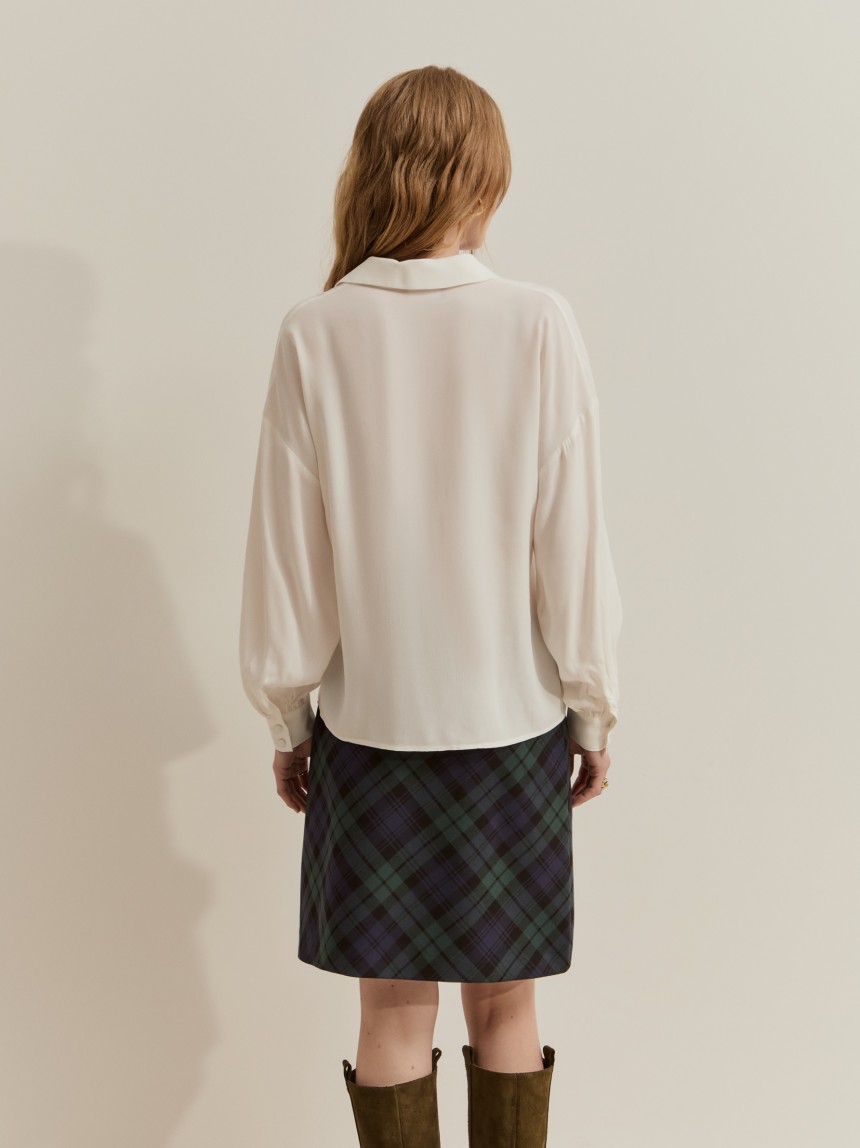 Blusa fluida con abertura frontal