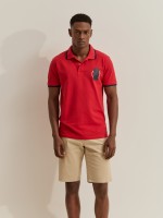 Polo piqu� com riscas e estampado